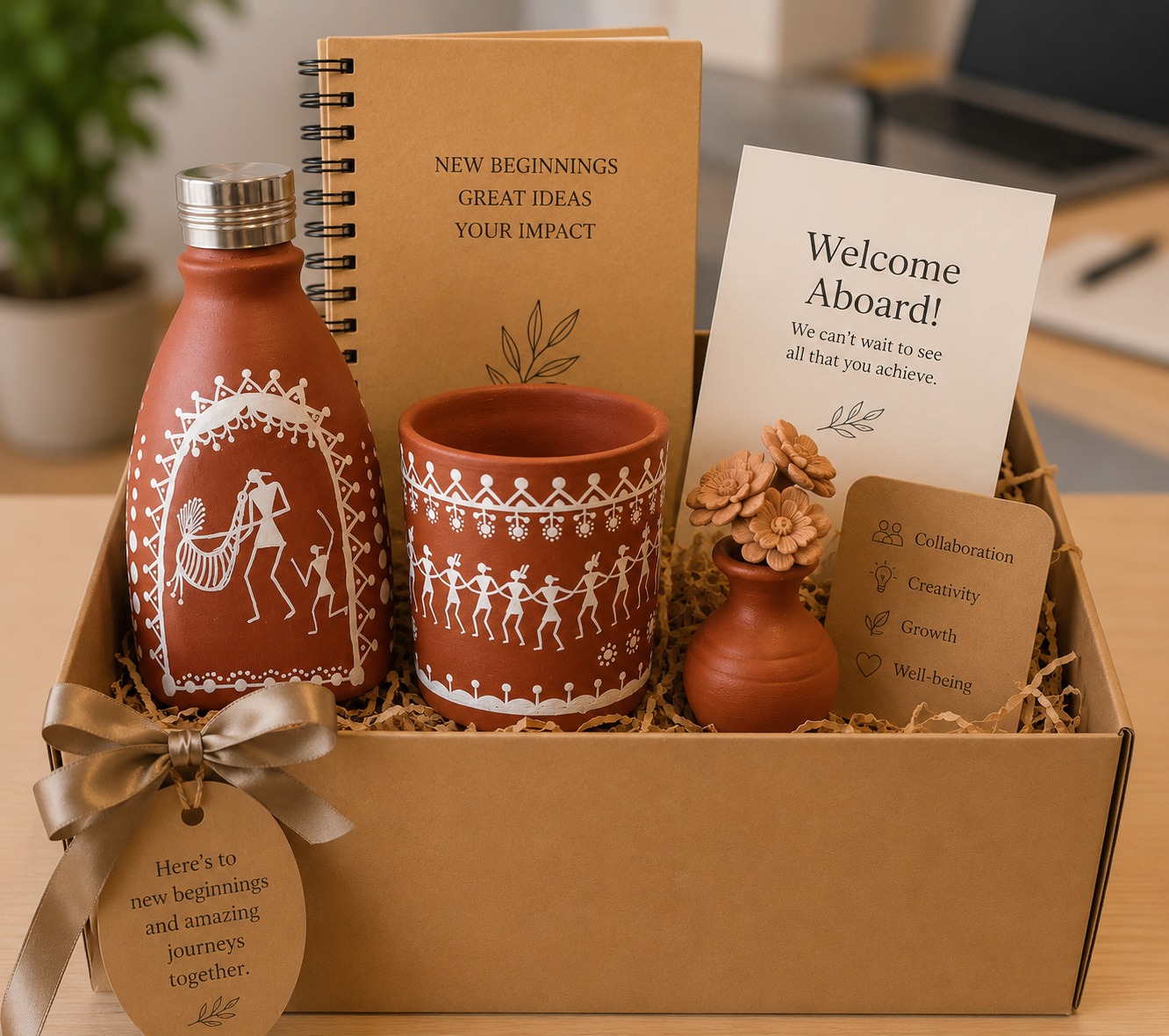 Eco New Beginnings welcome kit with terracotta Warli bottle, planter and notebook