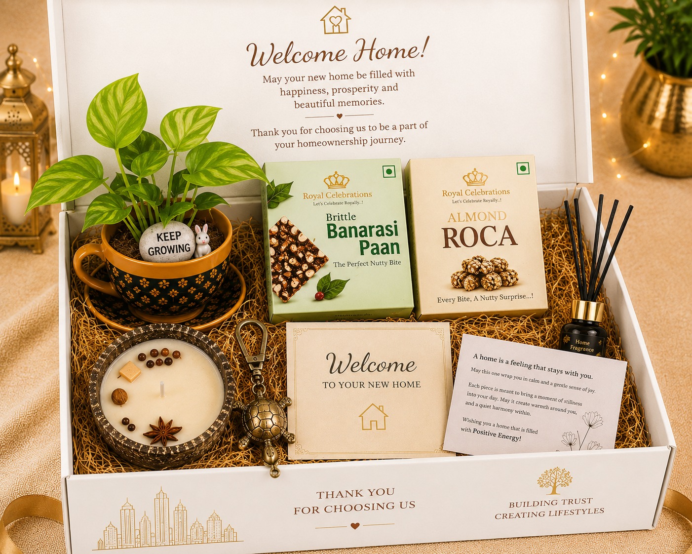 Welcome Home housewarming gift box with plant, candle, diffuser and almond treats