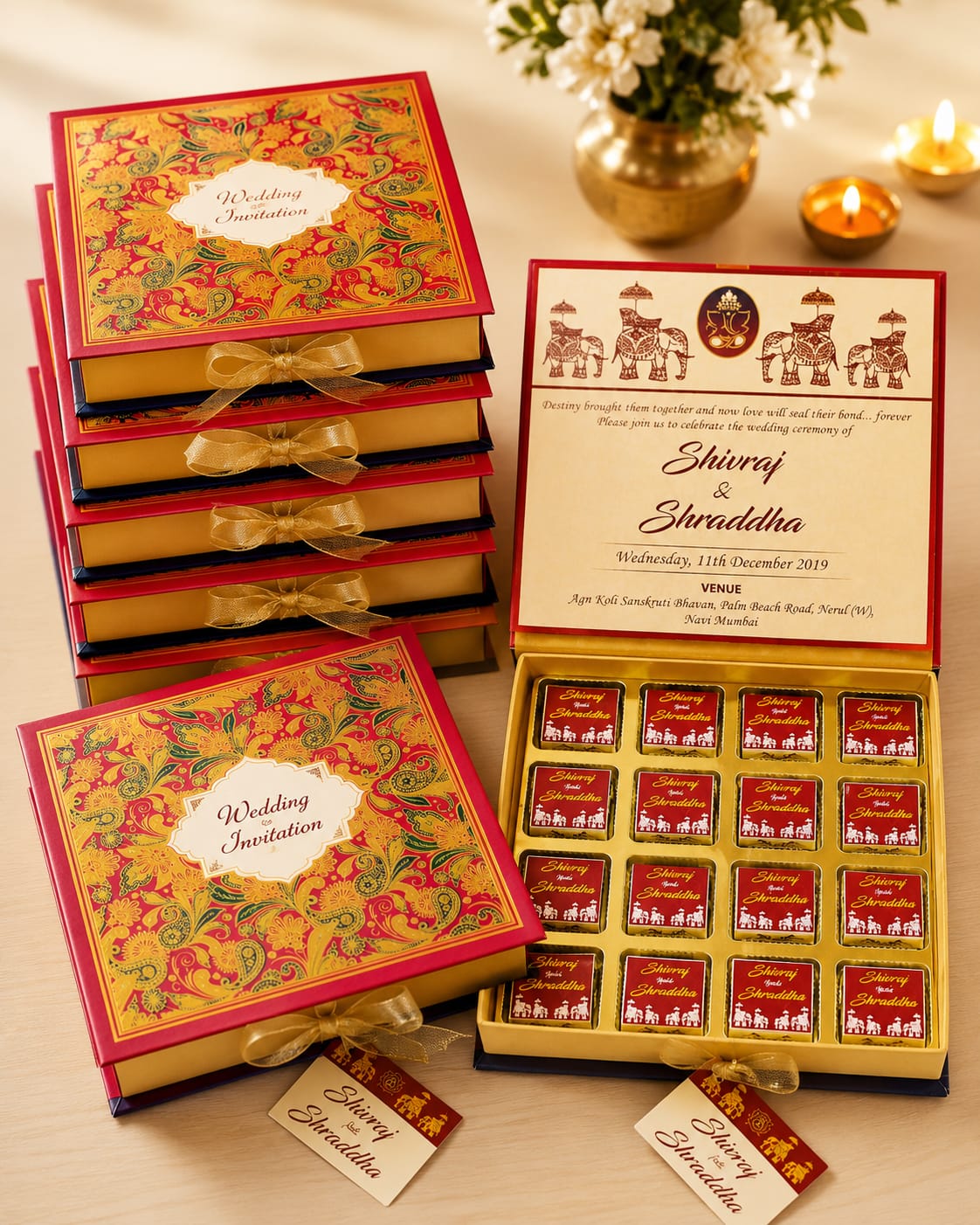 Premium red and gold wedding invitation chocolate box with elephants motif and diyas