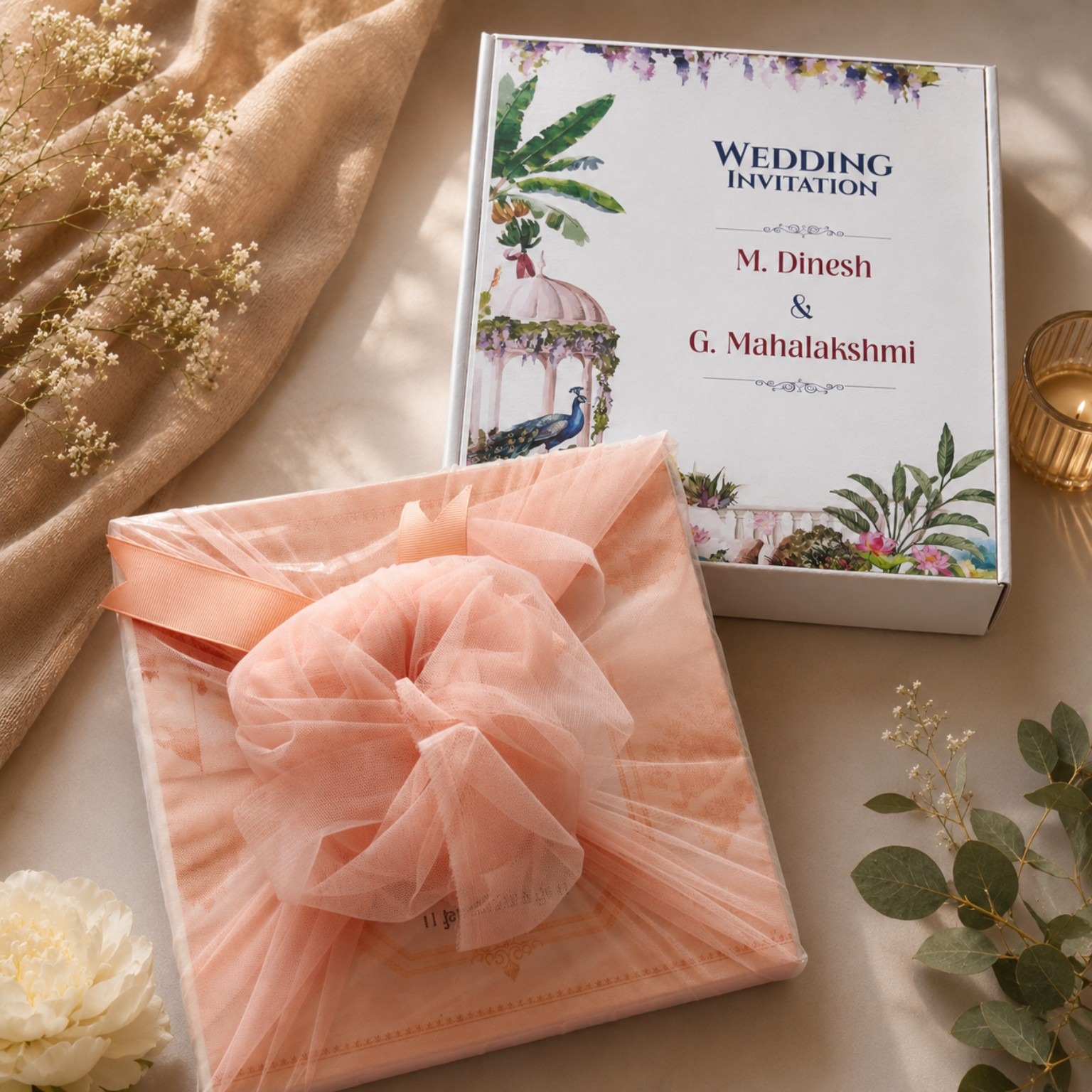 Wedding invitation gift box wrapped in peach tulle by Royal Celebrations